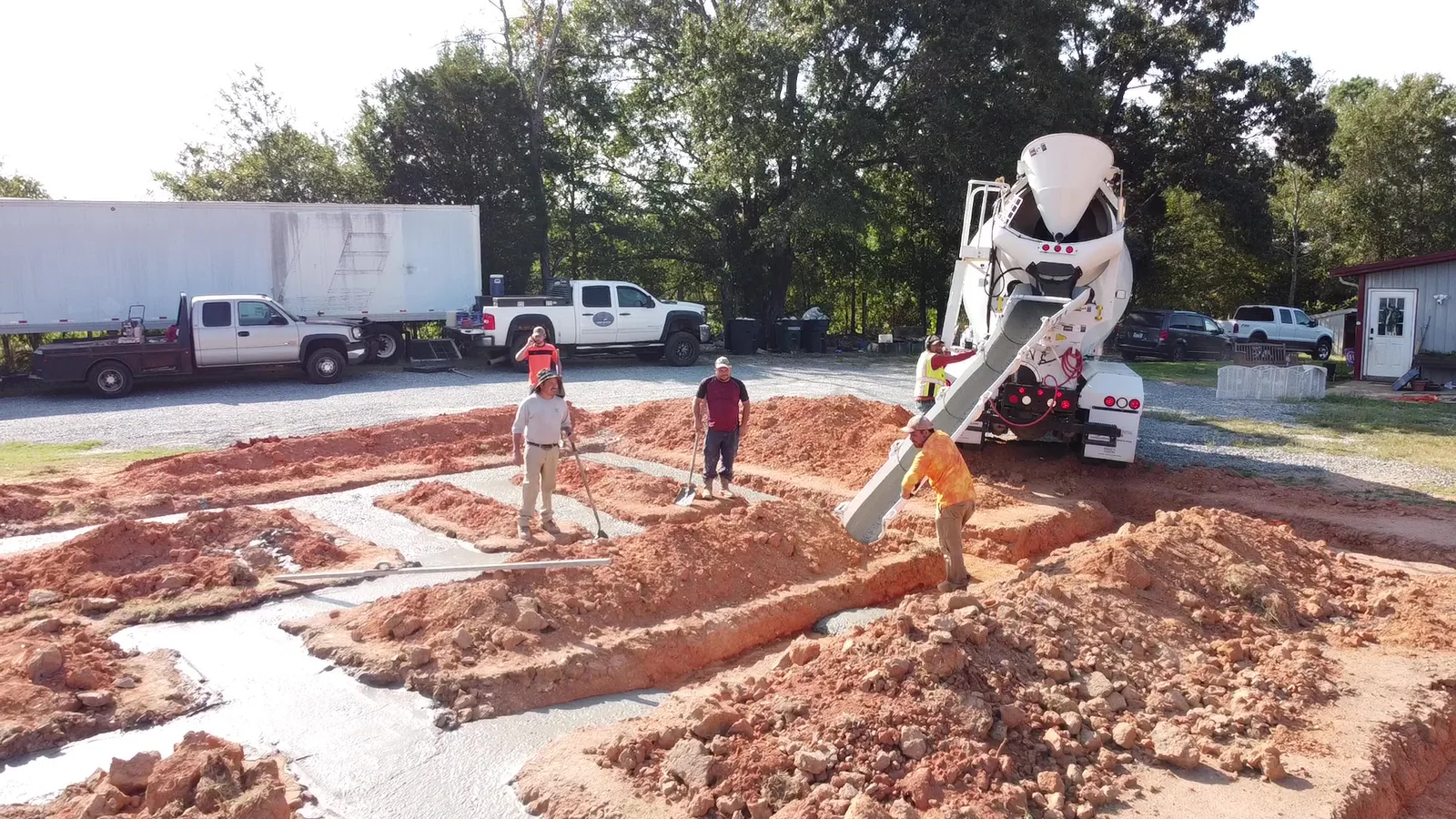 Concrete crew pouring footings for a new foundation in Shelby, NC