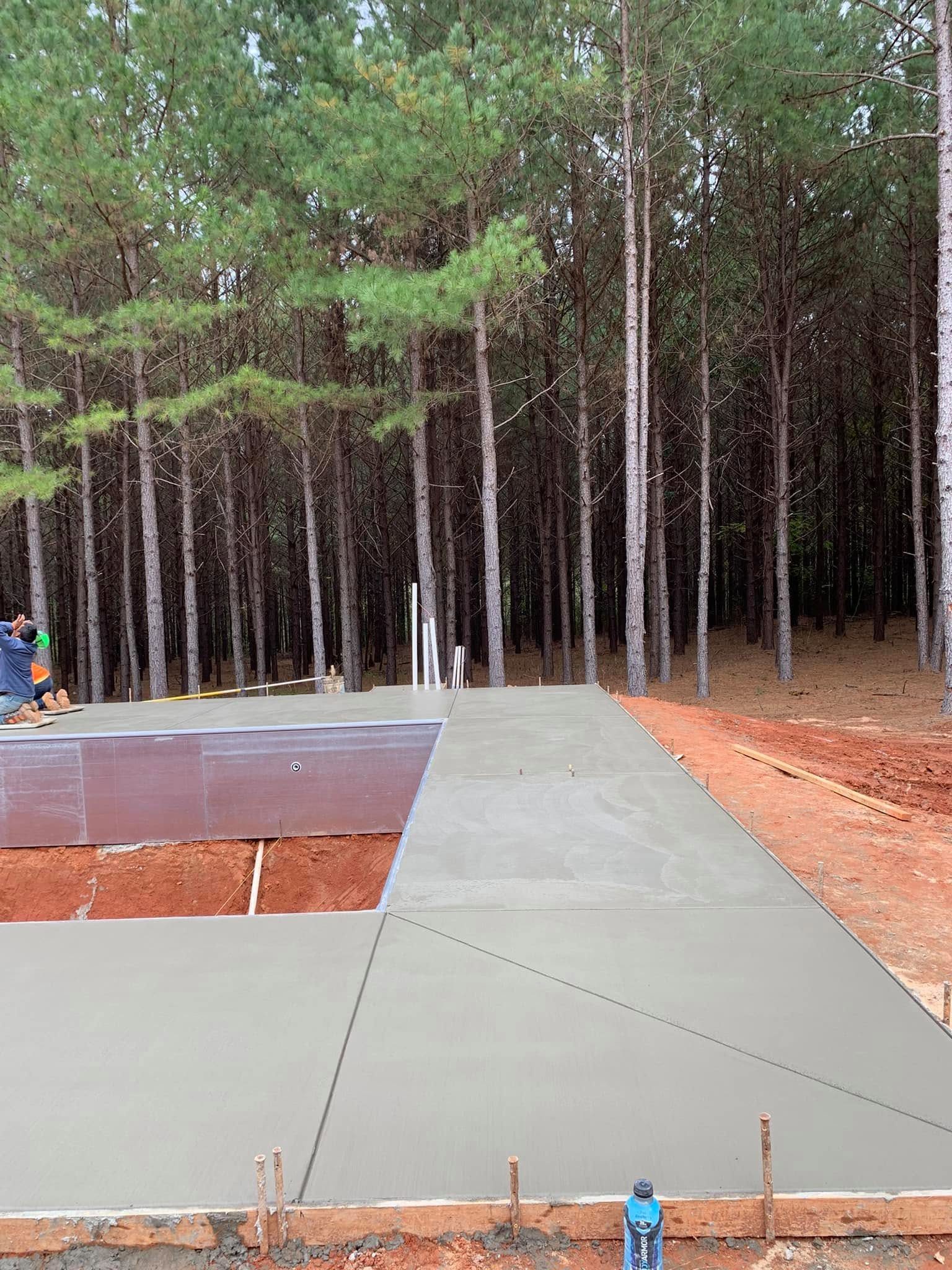 Residential concrete pool deck installation in progress